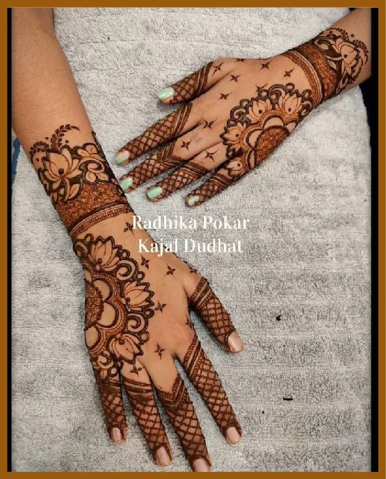 Stylish Back Hand Leafs And Flowers Loops With Net Design Stylish Back Hand Mehndi Design